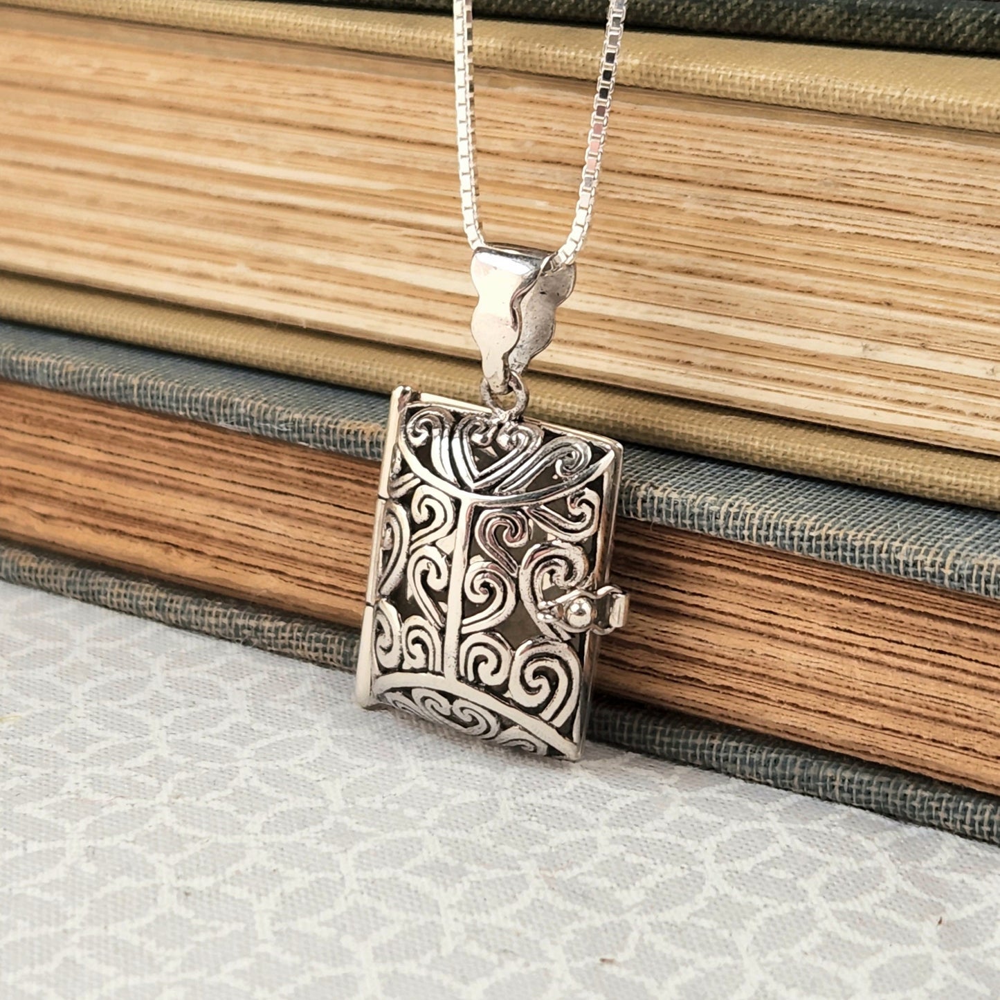 Aromatherapy Book Locket Opens to hold scented fabric